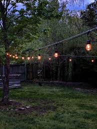 Outdoor String Lights Across A Backyard Place Of My Taste