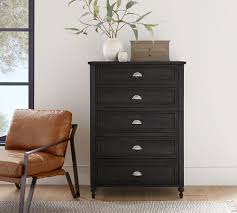 The design is tall, long, with deep and narrow drawers. Astoria 5 Drawer Tall Dresser Pottery Barn