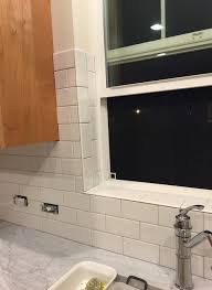 It will likely be white subway tile under the upper cabinets and on the entire wall of windows. Does This Look Right Subway Backsplash