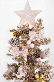 A snowy flocked christmas tree decorated in silver and gold adds a big dose of holiday cheer to this modern farmhouse living room. How To Spray Paint Your Christmas Tree 5 Minutes For Mom