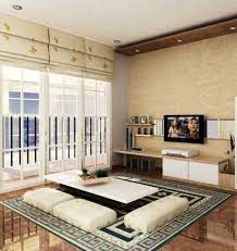 Dekorasi ruang tamu bergaya minimalis yang memilih aksen kayu pada mejanya | portofolio by : Inspirasi Dekorasi Ruang Keluarga Tanpa Sofa Konsep Lesehan Unik