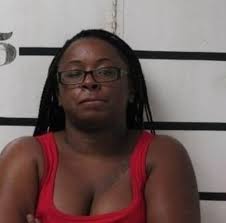 Decatur woman arrested after marijuana, 8 firearms, cash discovered in  narcotics search