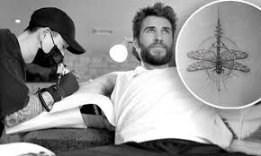 Chris hemsworth rune tattoo explanation i kept. Liam Hemsworth Shows Off New Dragonfly Tattoo Etched On His Arm Daily Mail Online