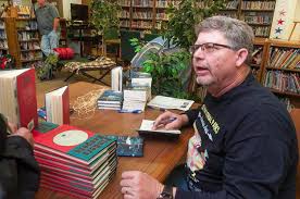 Deering signs new book, 'The Day Old Faithful Stopped'