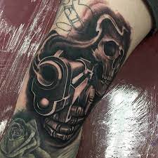 Find tattoo designs, photos, tattoo discussion forum, tattoo shows and conventions, studio directory, artist interviews, events, images, video, articles and advice. Skull And Gun Hand Tattoo Novocom Top