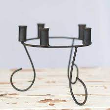 Good also for outdoor usage, it is designed for 8 glass cups ideal for tealights or votive candles. Metal Stand 5 Candle Holder Decor World