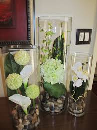 With bold colours in ceramic to subtle shades in glass and metal, the large and small styles will refresh your room. Tall Cylinder Vase Set Simple But Beautiful Got This Idea In Spain A Few Weeks Ago Lo Flower Vase Arrangements Glass Vase Decor Cylinder Vase Centerpieces