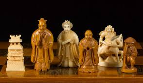 Pure mammoth ivory sculptures show intricate work. Bonhams A Carved Ivory Netsuke Figural Chess Set Japan Circa 1950