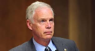 Ron johnson has tested positive for coronavirus, making him the third united states senator to test positive for the virus in the last week. Ron Johnson As Heartless Christmas Villain In Protest Outside His Office Shepherd Express