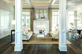 The dining room is to the right, and the family room is behind the photographer. 20 Beautiful Uses Of Decorative Columns Inside The Home