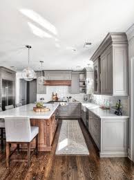 White Grey And Natural Wood Kitchen Farmhouse Kitchen Remodel White Kitchen Remodeling Grey Kitchen Designs