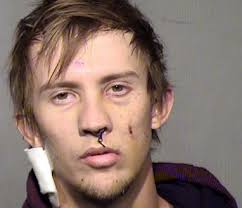 Driver, Shot In Face by Cop After 8-Second Exchange, Faces Trial For  Assault