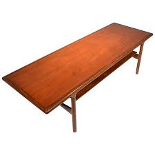 All surfaces has been cleaned and polished. Rare Large Midcentury Extending Teak Coffee Table With Floating Shelf For Sale At 1stdibs