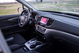 Technical grain on the instrument panel, doors and shifter control add an extra touch of refinement to the spacious interior. 2021 Honda Ridgeline Interior Photos Carbuzz