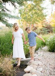White Flowy Dress For Family Photos Women Clothing Boutique Outdoor Family Photos White Flowy Dress