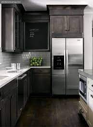 Dark gray shaker kitchen cabinets Pin By Steven Muth On Home Stained Kitchen Cabinets Backsplash With Dark Cabinets Kitchen Remodel