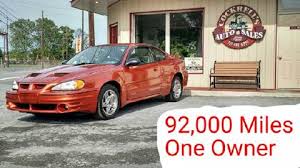 Image result for Sunburst Orange 2004 Pontiac