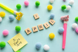 Premium Photo | April 1st image of text april 1 and festive decor on the  blue background april fool's day