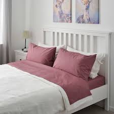 These are very interesting dark navy or black bedding sets with blush or pink flowers on them. Ullvide Sheet Set Dark Pink Full Double Ikea