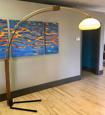 This arching downbridge floor lamp has a retro lattice giclee shade with a diffuser, making it perfect for reading and other tasks that require downlighting. Arc Lamp In Brass Oak By Nova Lighting Mid Century Floor Lamps For Sale Sweet Modern Akron Oh