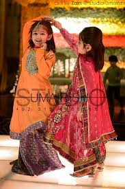 Pakistani Little Girls Enjoying At Wedding Pinned By Zartashia Kids Dress Collection Little Girl Dresses Kids Dress