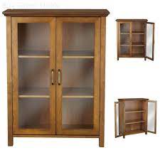 Chesterfield floor cabinet with 1 glass door it is a floor cabinet with one glass door that is a fantastic addition to any office, laundry, bedroom the media stand offers 2 glass door cabinets with 2 wood shelves, 2 side door cabinets, 2 clear glass paneled center cabinets with 1 shelf, 3 open. Oak Floor Cabinet Case Display Storage Shelf Box 2 Glass Doors Elegant New Ebay
