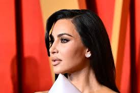 Kim Kardashian exposes her 'secret face tape' in alarming close-up at  Oscars afterparty as fans spot strange 'dent'