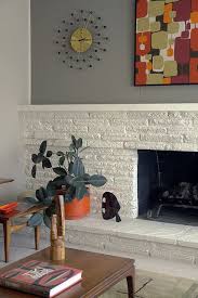 Making over our mid century fireplace. Living Room Fireplace Detail Painted Stone Fireplace Mid Century Modern Living Room Mid Century Modern Interiors