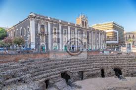 It is the second largest city in sicily with the metropolitan area reaching one million inhabitants, a major transport hub. Catania Sizilien Italien Romisches Amphitheater 2 Jh N Fototapete Fototapeten Tour Tourismus Catania Sizilianisch Myloview De