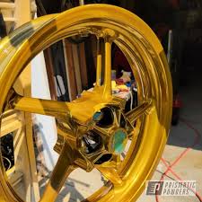 Motorcycle Wheel Coated with Clear Vision, Super Chrome Plus and Brassy  Gold