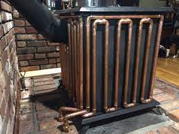 We use a home built wood boiler unit. Homemade Wood Stove Hydronic Radiant Heat Setup Heating Help The Wall