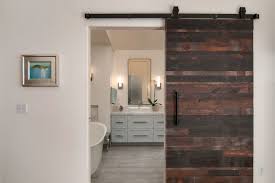 Фото из проекта reclaimed bathroom. Reclaimed Wood Barn Door Entrance Modern Bathroom San Diego By Uniq Kitchen And Bath Designs Houzz