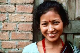Young Tibetan woman being shy. Yarlung Valley, Tibet. 1986, Kodachrome.