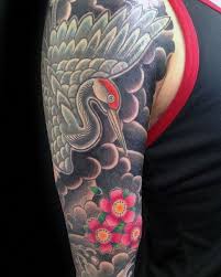 Birds And Clouds Tattoo Guy With Traditional Japanese Crane Bird Clouds Sleeve Tattoo On Arm Tattoosformen Japanese Tattoo Full Sleeve Tattoos Sleeve Tattoos