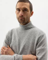 Soft knit sweaters for men in merino wool, wool, and cotton.