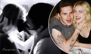Brooklyn beckham's fiancee nicola peltz has sparked rumours she's pregnant after showing off a huge baby bump. Brooklyn Beckham And Fiancee Nicola Peltz Share A Passionate Kiss While Wearing Face Masks Daily Mail Online