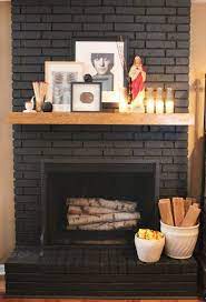 Red brick does not have to be a permanent, unchangeable feature in your home. Kylie M Interiors How To Update Your Fireplace 5 Easy Update Ideas Painted Brick Fireplaces Black Brick Fireplace Painted Brick Fireplace