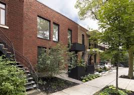 Articles About Transformative Duplex Renovation Montreal On Dwell Com Brick Exterior House Red Brick House Exterior Montreal Architecture