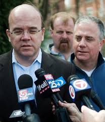 Kerry and McGovern view flood damage