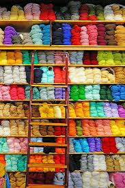 Knitting store contains yarn and stitching materials for children to use in their crafts class which kindles interest of mothers also to restart crafts learn in childhood. Shelves Filled With Colorful Wool Yarn Spools In A Knitting Store By Eq Roy Photo Stock Snapwire