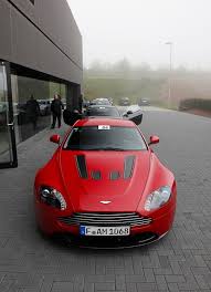 Image result for Fire Red 2012 Aston Martin