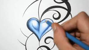 Blue letter a tattoo design; Tribal Tattoo Design With A 3d Blue Heart Incorporated Youtube