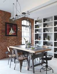 The wood's live edge that follows the natural shape of the tree increases the beauty of the table. 29 Industrial Dining Rooms With Raw Beauty
