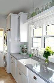 Solid surface countertops for the kitchen. White And Gray Corian Countertops Corian House