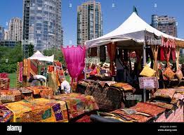 Yaletown, Vancouver, BC British Columbia, Canada - Textiles from Indonesia  for Sale at Outdoor Bazaar and Market, David Lam Park Stock Photo - Alamy