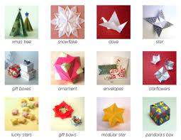 Fold the paper in half both ways and unfold. Christmas Origami