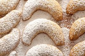 The christmas season is almost upon us. Austrian Christmas Cookie Kokosbusserl Coconut Macaroons Traditional Austrian Jelly Christmas Linzer Cookies With Orange And Red Jam On A Wooden Board With Festive Decoration Loise Mcguffey