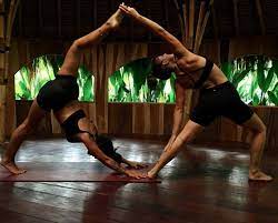 The presence of someone around motivates you to do better. 10 Fun Yoga Poses For Two People 10 Is Wild
