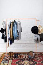 (4) pieces of 1x4 board cut with one end cut at 15 degrees from corner (rails) Diy Copper Clothes Rack Room Makeovers To Suit Your Life Hgtv