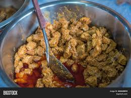 Kaeng hang le originates from myanmar.the origins perhaps are closer to the northern thai border in myanmar, where a pork curry called wet tha hin (ဝက်သားဟင်း) includes a sour component, just as the thai version includes tamarind. Hangle Curry Northern Image Photo Free Trial Bigstock